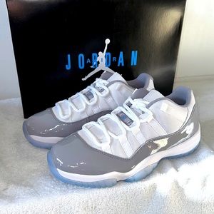 Air Jordan 11 Retro low. Size 7M/8.5 W. White/University Blue.